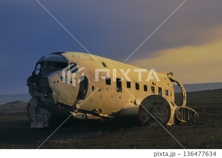 Wreck of an airplane stranded 136477634