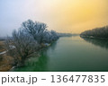 Winter sunrise and fog on Siret river 136477835