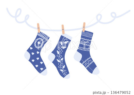 Winter Socks Hanging on Clothespins Seamless Illustration Set with Cozy Seasonal Mood 136479052
