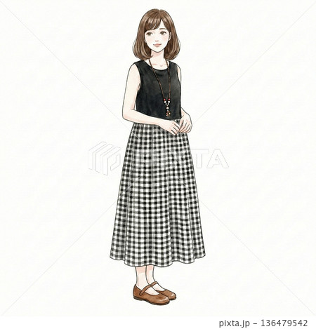 ワンピースでポーズするファッショナブルな若い女性 ワンピースでポーズするファッショナブルな若い女性 136479542