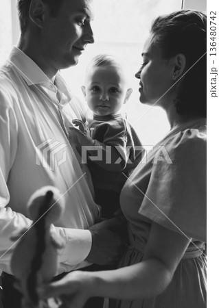 Family bond captured during a moment of affection 136480742