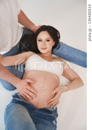 Expecting parents celebrate the joy of pregnancy together Expecting parents celebrate the joy of pregnancy together 136480814