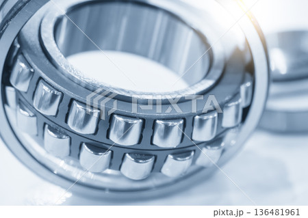 Close Up Rolling Bearing Parts with Blue Tone Lighting Effect in Industrial Scene 136481961