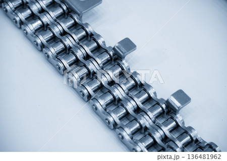 Close Up Industrial Double Roller Chain Drive in Blue Tone Mechanical Scene 136481962