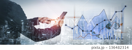 Business professional using smartphone to analyze financial data with futuristic graphics and city skyline as background in modern urban setting Scalp Business professional using smartphone to analyze financial data with futuristic graphics and city skyline as background in modern urban setting Scalp 136482314