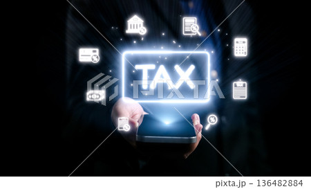 Hands Holding Smartphone with Digital Tax Symbols and Icons Representing Taxation, Financial Planning, and Economic Transactions in a Dark Background. Qubit Hands Holding Smartphone with Digital Tax Symbols and Icons Representing Taxation, Financial Planning, and Economic Transactions in a Dark Background. Qubit 136482884