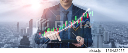 Businessman Analyzing Financial Data on Tablet with Graphs, Modern Cityscape in the Background, Concept of Digital Finance Impute Businessman Analyzing Financial Data on Tablet with Graphs, Modern Cityscape in the Background, Concept of Digital Finance Impute 136482955