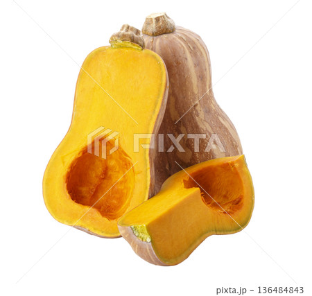 Pumpkin Butternut Squash Cut into pieces isolated on a white background Pumpkin Butternut Squash Cut into pieces isolated on a white background 136484843