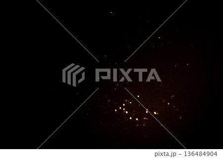 Golden abstract bokeh on black background. Holiday concept Golden abstract bokeh on black background. Holiday concept 136484904