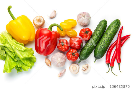 Fresh farm vegetables including peppers, cucumbers, tomatoes, garlic 136485870