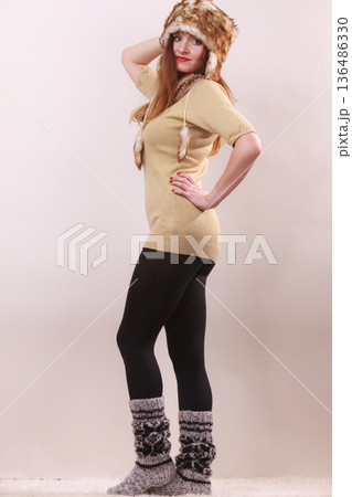 Beautiful winter woman in warm clothing Beautiful winter woman in warm clothing 136486330