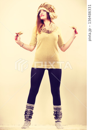 Beautiful winter woman in warm clothing 136486331