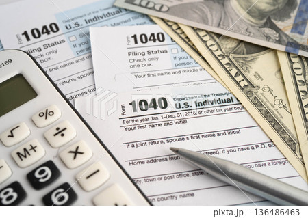 Tax form 1040 U.S. Individual Income Tax Return and bitcoin, business finance, Digital currency, Virtual cryptocurrency. Tax form 1040 U.S. Individual Income Tax Return and bitcoin, business finance, Digital currency, Virtual cryptocurrency. 136486463