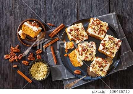 Carrot cake squares with cream cheese and pecan Carrot cake squares with cream cheese and pecan 136486730