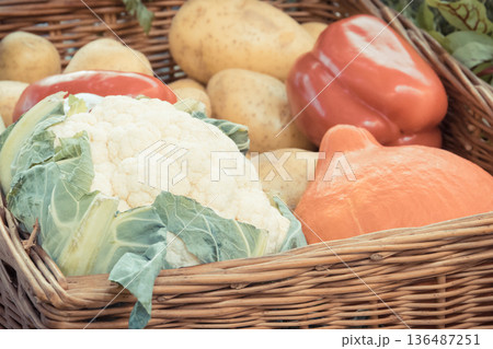 Fresh vegetables in basket as ingredients containing minerals and vitamins 136487251