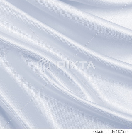 Smooth elegant grey silk or satin luxury cloth as wedding background. Luxurious Christmas background or New Year background design Smooth elegant grey silk or satin luxury cloth as wedding background. Luxurious Christmas background or New Year background design 136487539