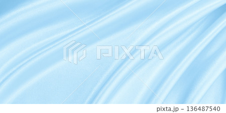Smooth elegant blue silk or satin luxury cloth texture as abstract background. Luxurious background design Smooth elegant blue silk or satin luxury cloth texture as abstract background. Luxurious background design 136487540