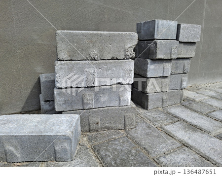 Grey paving slabs at a construction site 136487651