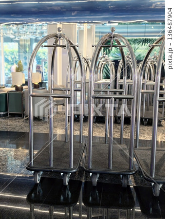 luggage trolley service in the hotel 136487904