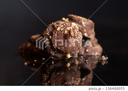 Crunchy Chocolate Snacks With Nuts, Coated In Tasty Chocolate Crunchy Chocolate Snacks With Nuts, Coated In Tasty Chocolate 136488055