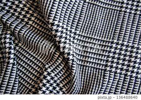 Cotton black and white cage. Textile cloth background in summer day for fashion clothing. Cotton black and white cage. Textile cloth background in summer day for fashion clothing. 136488640