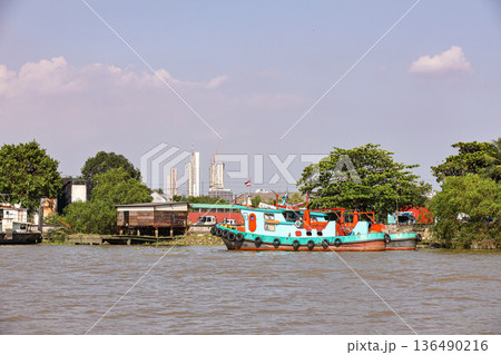 Tugboat, fire boat standby for service near Bang jak petrochemical plant, Bangkok Thailand. Tugboat, fire boat standby for service near Bang jak petrochemical plant, Bangkok Thailand. 136490216