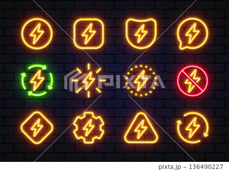 Neon vector set of electric power symbols in different shapes and styles. Glowing icons create a bold urban vibe on a dark brick wall. Ideal for energy themes, tech design, or signage projects. 136490227