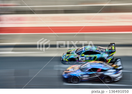racing supercars on the circuit, Battle of the teams, long exposure photography, supercars drive past at high speed, pitstops, training runs, watching people,  136491050