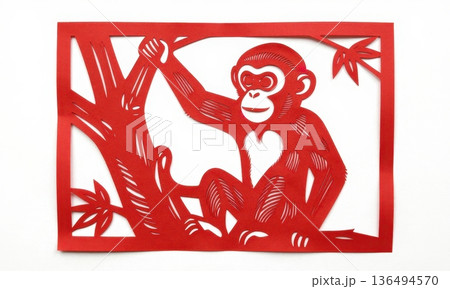 Traditional Chinese Red Paper Cut Art of Zodiac Monkey Climbing Tree. 136494570