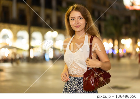 Young woman posing at Royal Square (Placa Real) in Barcelona Young woman posing at Royal Square (Placa Real) in Barcelona 136496650