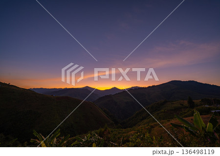 Majestic Highlands Under a Dramatic Sunset Sky 136498119