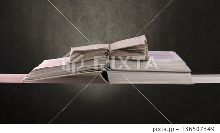 Still life with old books on a shelf 136507349