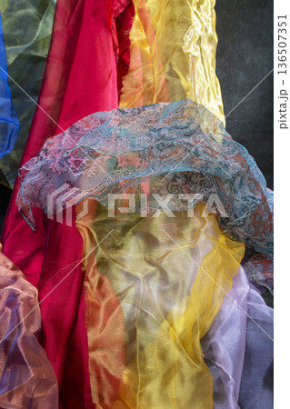 Abstract background made of colored fabric scraps 136507351