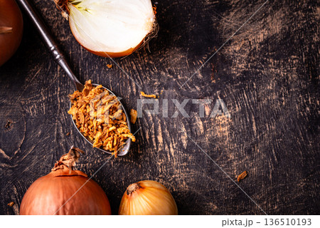 Bowl with chopped fried crispy onions 136510193