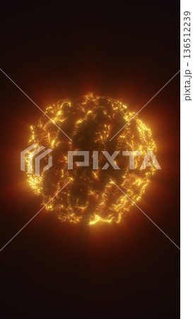 Glowing golden plasma sphere made of sparkling particles and fiery filaments on a dark background, creating a dramatic cosmic energy effect 136512239
