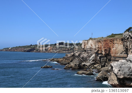 Panoramic view of Cascais coastline with Guia Lighthouse in Portugal. Panoramic view of Cascais coastline with Guia Lighthouse in Portugal. 136513097