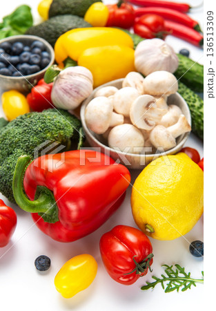 Healthy eating concept with fresh colorful vegetables and fruits 136513309