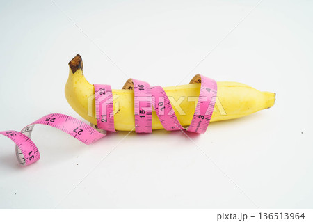Banana with measuring tape, penis health. 136513964