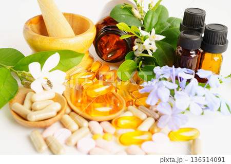 Alternative medicine herbal organic capsule with vitamin E omega 3 fish oil, mineral, drug with herbs leaf natural supplements for healthy good life. Alternative medicine herbal organic capsule with vitamin E omega 3 fish oil, mineral, drug with herbs leaf natural supplements for healthy good life. 136514091