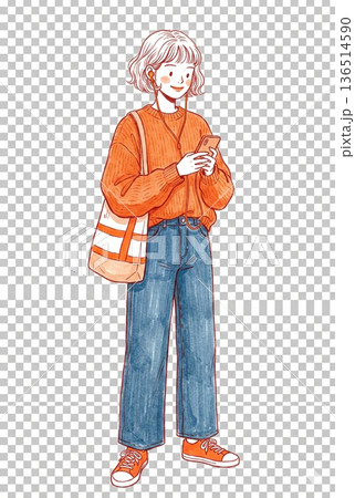 オレンジのニットを着てスマホで音楽を聴く若い女性 136514590