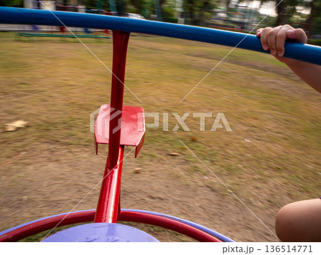 Children playground merry-go-round in the park Children playground merry-go-round in the park 136514771