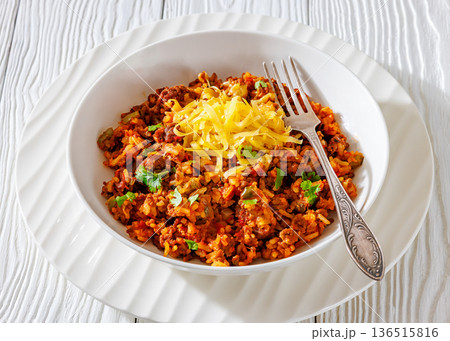 Texas hash of beef pepper onion tomato and rice Texas hash of beef pepper onion tomato and rice 136515816