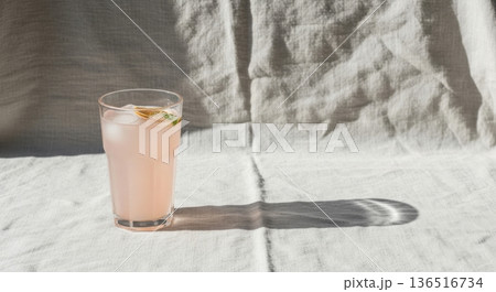 Minimalist Iced Tea with Lemon and Mint on Linen Tablecloth Minimalist Iced Tea with Lemon and Mint on Linen Tablecloth 136516734