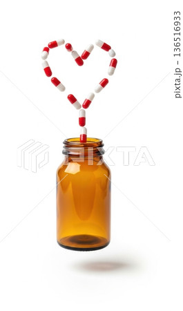 Heart Shape Formed by Capsules from Medical Jar Heart Shape Formed by Capsules from Medical Jar 136516933