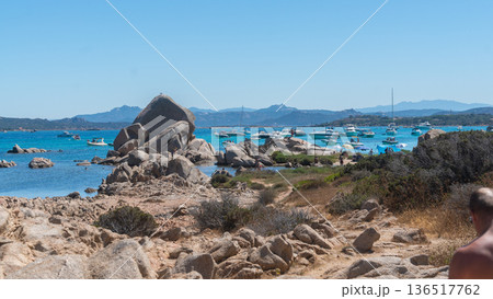 Panoramic view of rocky coast and blue sea. Mediterranean natural landscape for travel and nature use, La Maddalena, Italy Panoramic view of rocky coast and blue sea. Mediterranean natural landscape for travel and nature use, La Maddalena, Italy 136517762