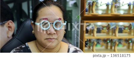 Phoropter for eye test, lenses glasses for eye check in optical store. 136518175