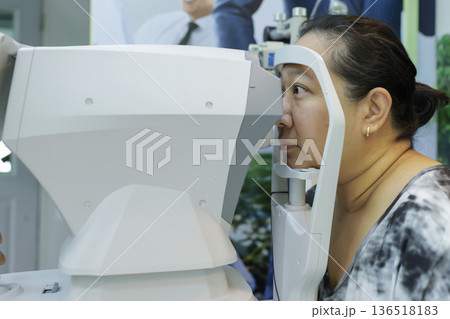 Phoropter for eye test, lenses glasses for eye check in optical store. 136518183