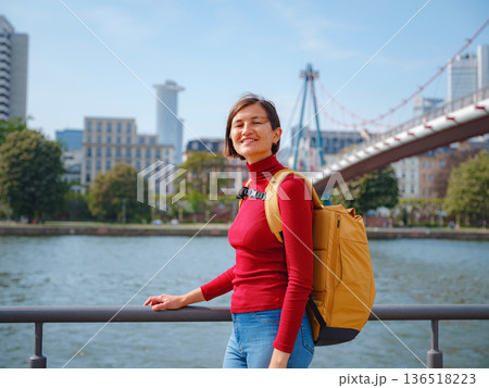 Tourist woman explores modern Frankfurt, Tourist woman explores modern Frankfurt, 136518223