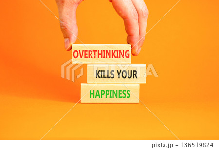 Overthinking kills your happiness symbol. Concept words Overthinking kills your happiness on wooden blocks. Beautiful orange background. Business overthinking kills happiness concept. Copy space. Overthinking kills your happiness symbol. Concept words Overthinking kills your happiness on wooden blocks. Beautiful orange background. Business overthinking kills happiness concept. Copy space. 136519824