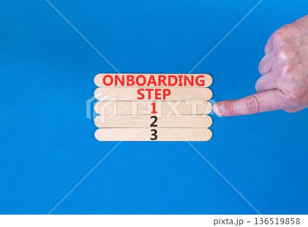 Time to step 1 onboarding symbol. Concept words Onboarding step 1 on beautiful wooden block. Businessman's hand. Beautiful blue background. Business success step 1 onboarding concept. Copy space. Time to step 1 onboarding symbol. Concept words Onboarding step 1 on beautiful wooden block. Businessman's hand. Beautiful blue background. Business success step 1 onboarding concept. Copy space. 136519858